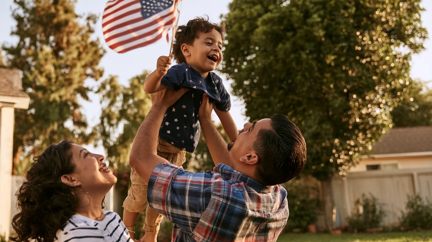 Family celebrating with American flag