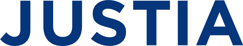 JUSTIA wordmark in bold navy blue capital letters